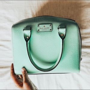 Kate spade teal hand bag.